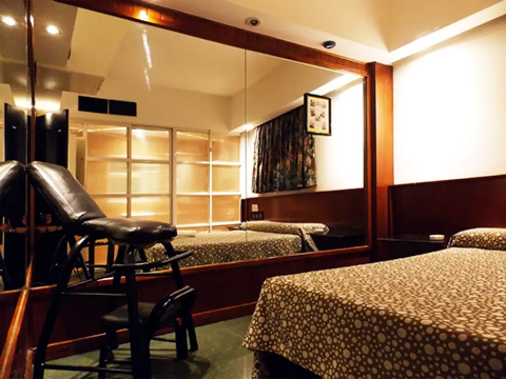 Habitación con TV y frigobar en albergue Siglo XX Constitución