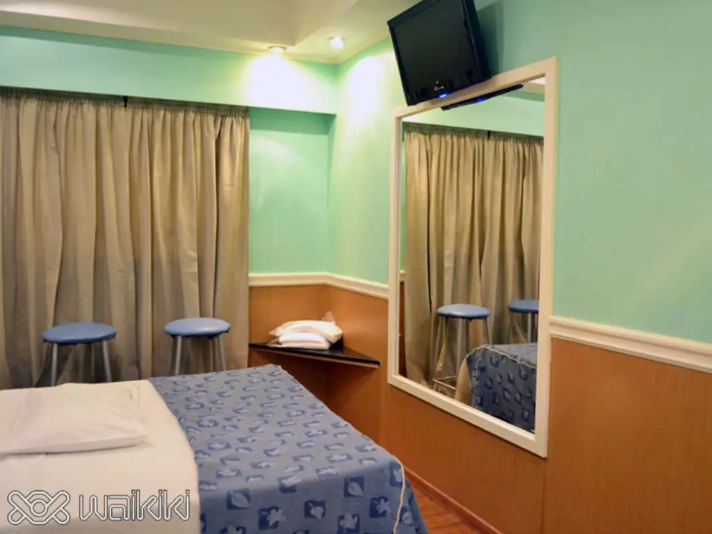 Suite con iluminación suave y jacuzzi privado en Caballito