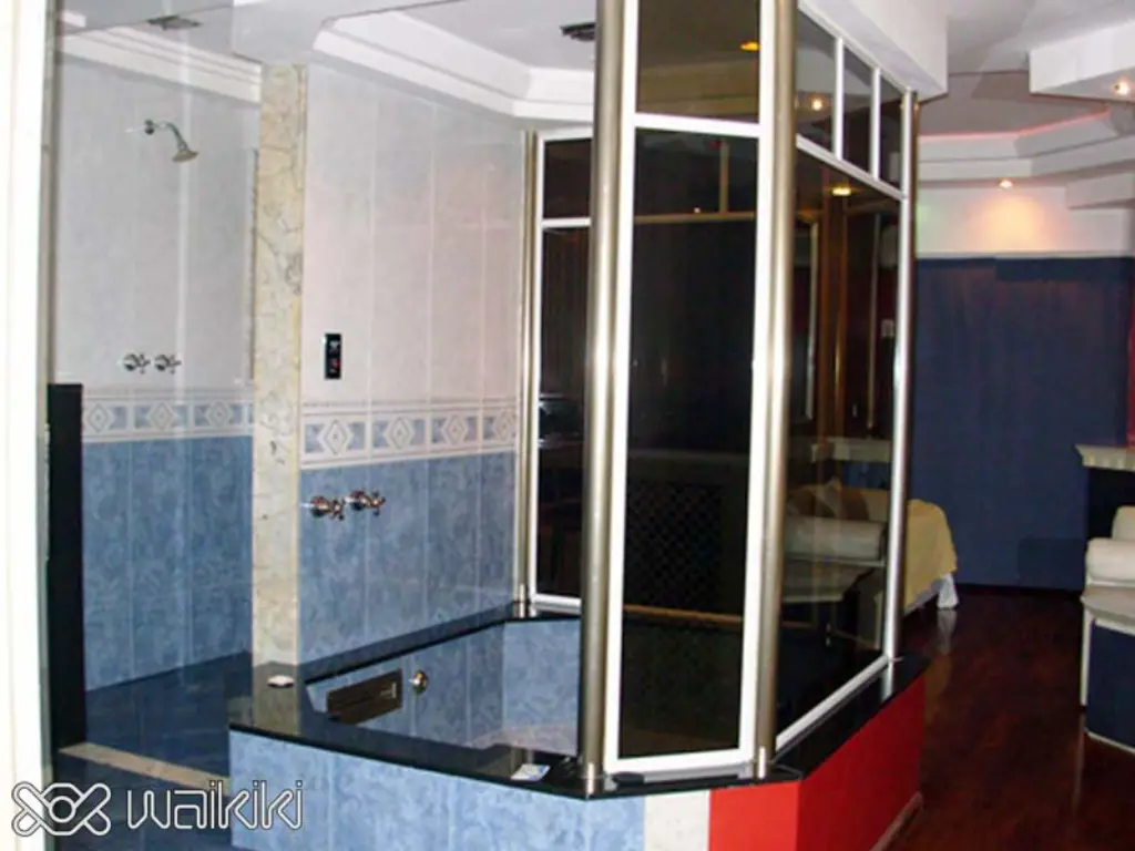 Hidromasaje privado con velas en hotel transitorio Waikiki